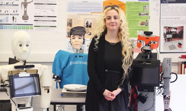 Prof. Goldie Nejat with elder-care robot prototypes. Photo courtesy Liz Do.